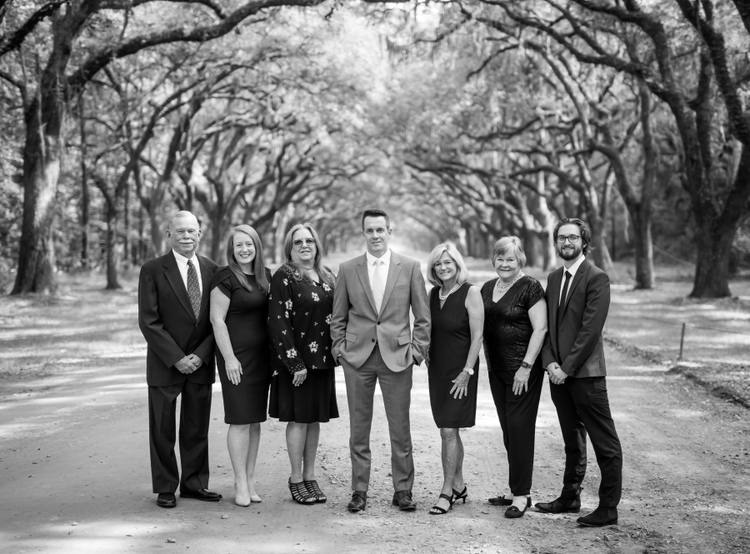 A team picture in black and white. Barrett. Kerri, Carrie, David, Lucy, Jody, Nathan